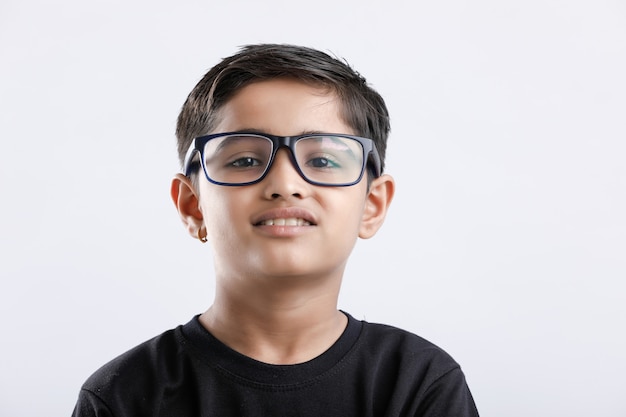 Indian child wearing spectacles and looking seriously