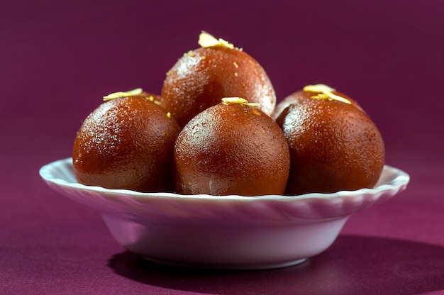 Indian Dessert : Gulab Jamun in white bowl