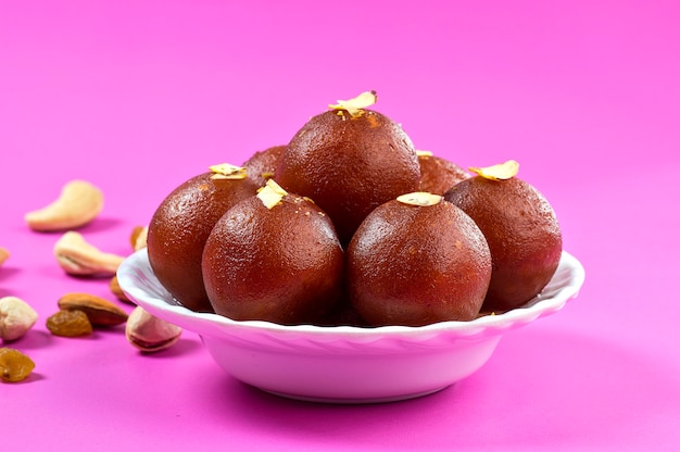 Indian Dessert Gulab Jamun in white bowl