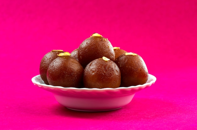 Indian Dessert Gulab Jamun in white bowl