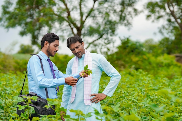 Indian farmer Discussing with agronomist at Farm and collecting some information