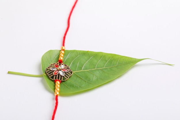 Indian festival Raksha Bandhan A traditional Indian wrist band which is a symbol of love between Brothers and Sisters