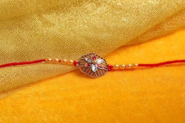 Indian festival Raksha Bandhan A traditional Indian wrist band which is a symbol of love between Brothers and Sisters