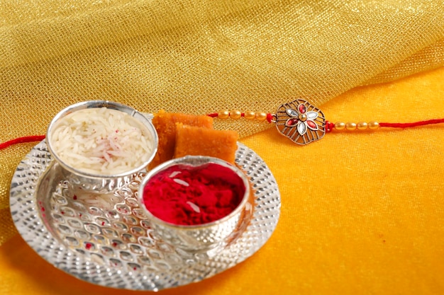 Indian festival Raksha Bandhan A traditional Indian wrist band which is a symbol of love between Brothers and Sisters