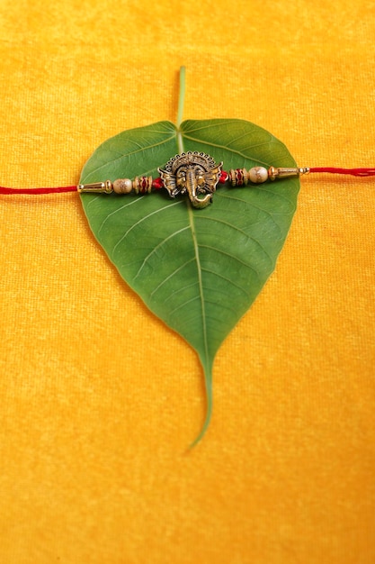 Indian festival Raksha Bandhan A traditional Indian wrist band which is a symbol of love between Brothers and Sisters