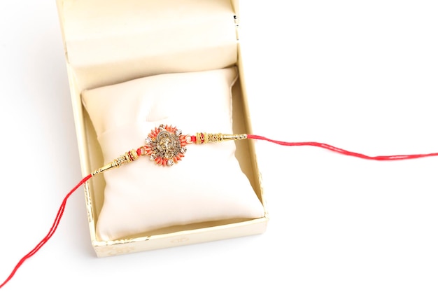 Indian festival Raksha Bandhan A traditional Indian wrist band on white background