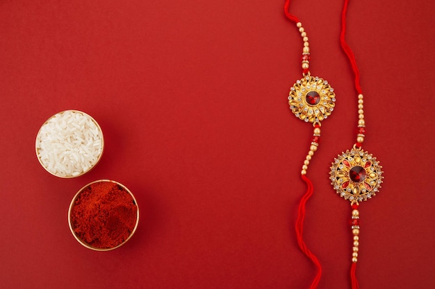 Indian festival raksha bandhan with wrist band rakhi rice grains and kumkum