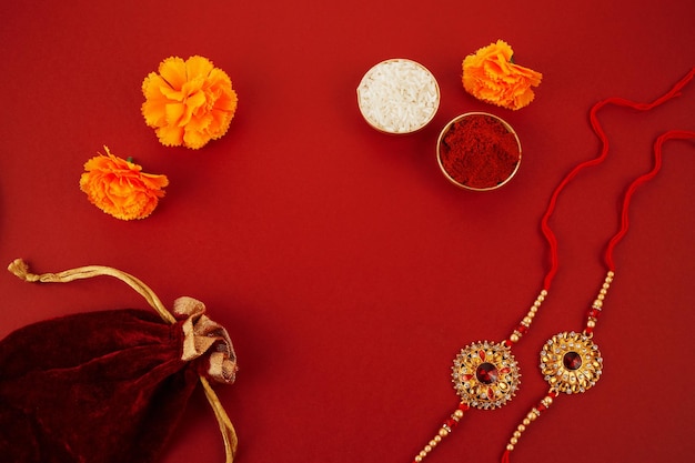 Indian festival raksha bandhan with wrist band rakhi rice grains and kumkum