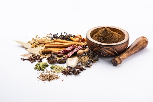 Indian Garam masala powder and colourful spices. selective focus