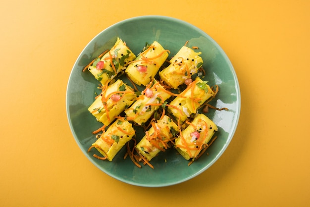 Indian gram flour snack called Khandvi or suralichya vadya, selective focus