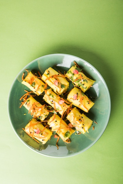 Indian gram flour snack called Khandvi or suralichya vadya, selective focus