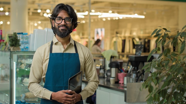 Indian male coffee store worker arabian waiter muslim man startup owner hispanic small business