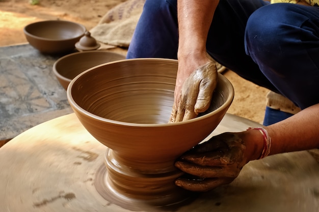 Indian potter at work, Shilpagram, Udaipur, Rajasthan, India