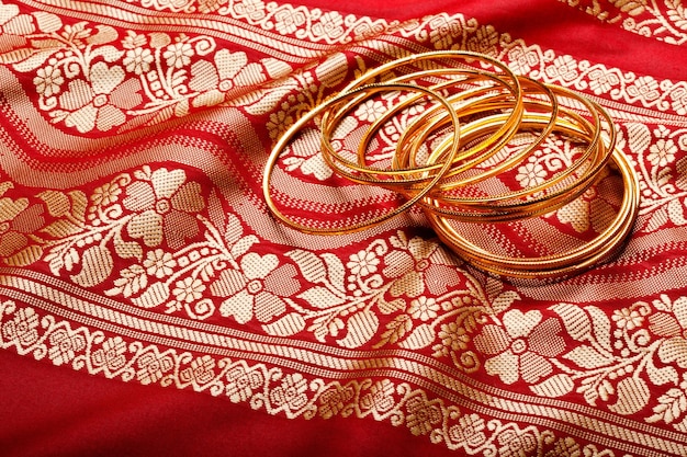 Indian sari with golden bangles