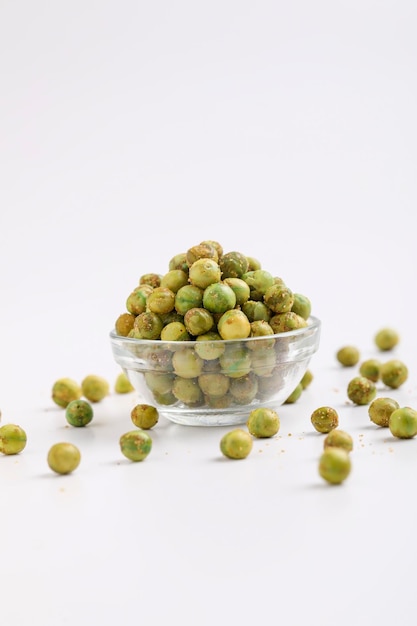 Indian snack dry spicy green pea in glass bowl