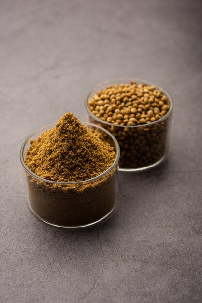 Indian spice Heap of Coriander powder or Dhaniya Powder or Chinese parsley dried seeds, selective focus