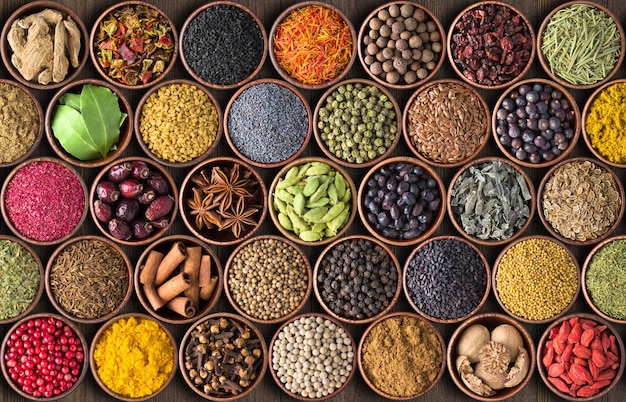 Indian spices and herbs background. various condiments, top view