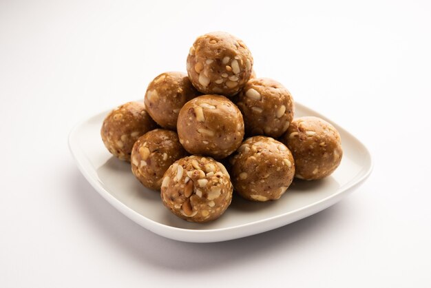 Indian sweet groundnut ladoo or mungfali or peanut laddo or laddu made using roasted peanuts and jaggery