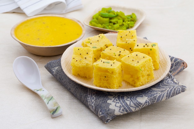 Indian Traditional Street Food Khaman Dhokla Served With Chutney & Chilli