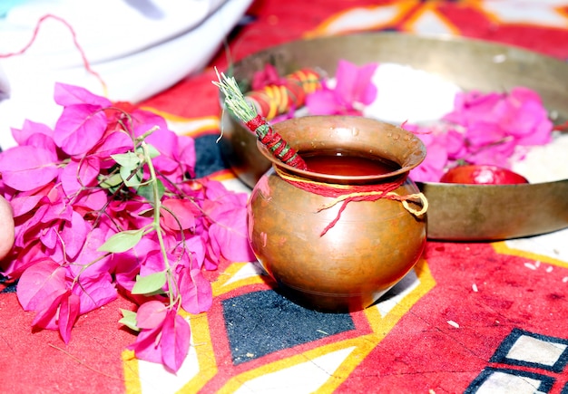 Indian Wedding traditional Thaali in the midst of beautiful and colorful flowers