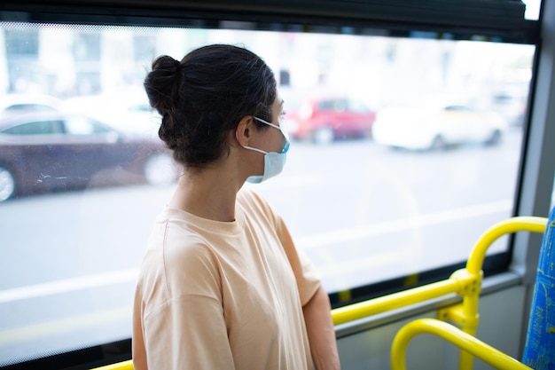 Indian Woman ride in public transport bus or tram