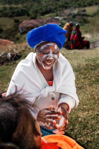 Indigenous person doing daily chores and showcasing lifestyle