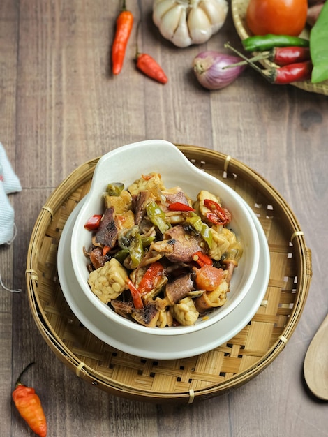 Indonesia traditional cuisine, Oseng tempe cumi asin, Spicy tempehstir fry with salted baby squid