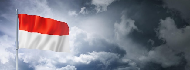 Indonesian flag on a cloudy sky