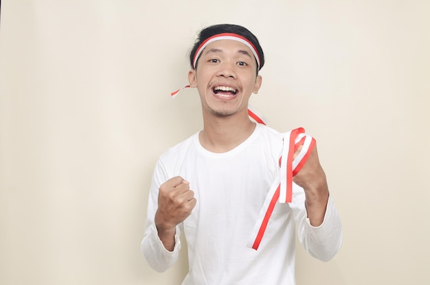 Indonesian man celebrate independence day with excited expression