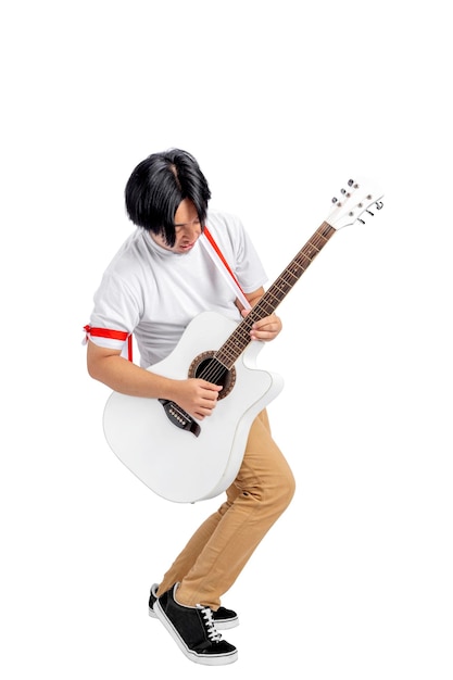 Indonesian men celebrate Indonesian independence day on 17 August while holding guitars and playing music isolated over white background