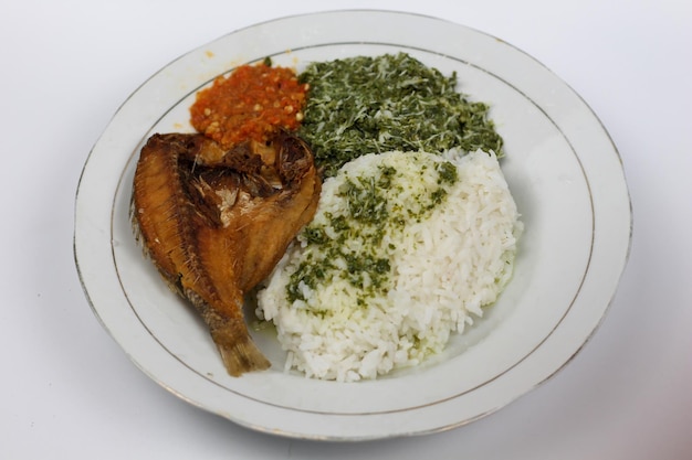 Indonesian mixed rice or mixed rice with foreign fish sweet potato leaf vegetables