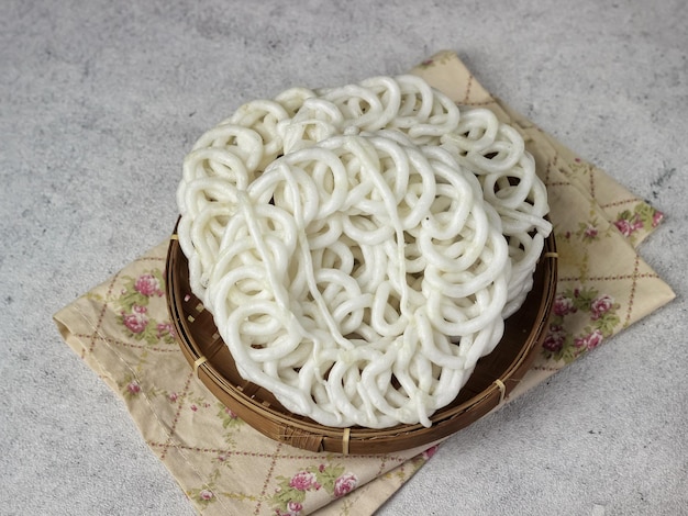 Indonesian Traditional Crackers Kerupuk Uyel. Served in Bamboo Plate, Popular as Kerupuk Warung