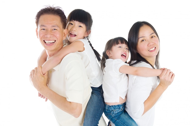 Indoor portrait of beautiful asian family