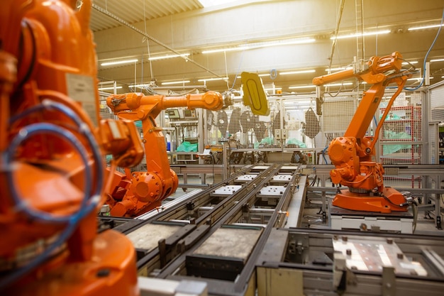 Industrial automatic robot arms in the production line inteligent factory industry