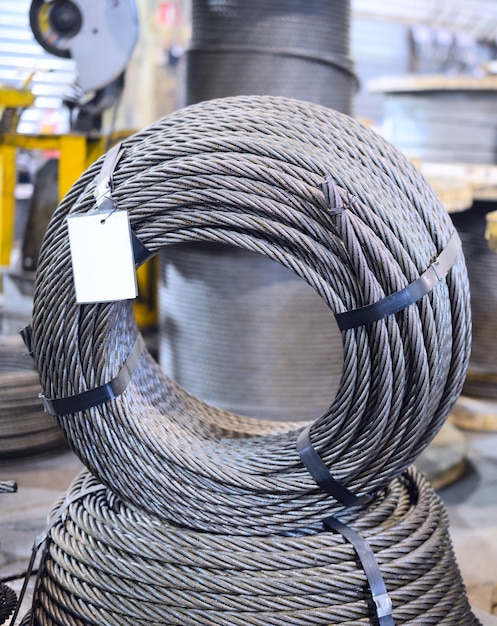 Industrial background. Steel hoist rope wrapped together in a ring