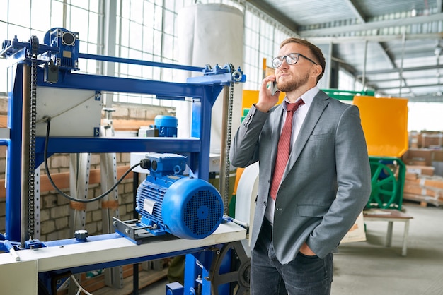 Industrial Businessman Speaking by Phone