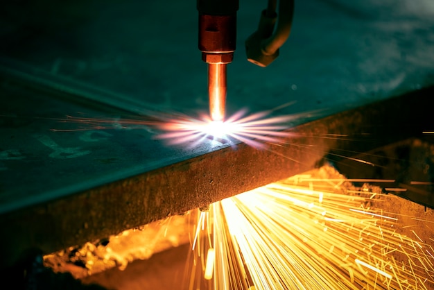 Industrial cnc plasma machine cutting of metal plate