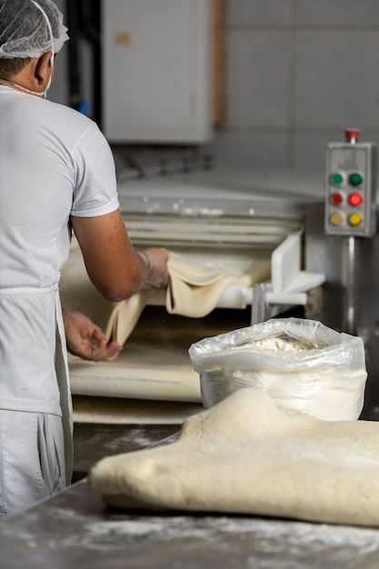 Industrial production of bakery products, preparing dough