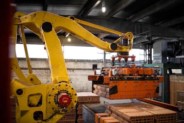 Industrial robotic arm machine assembling parts in factory