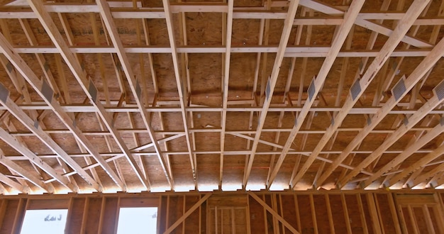 Industrial roof truss system with wooden timber beams an interior view house building