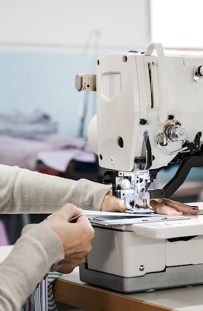 Industrial sewing machines with sewing machine operator