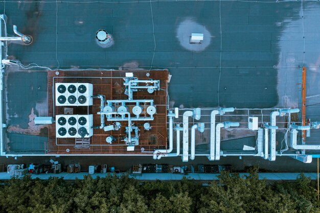 Industrial ventilation system on the roof of the supermarket aerial top view shot