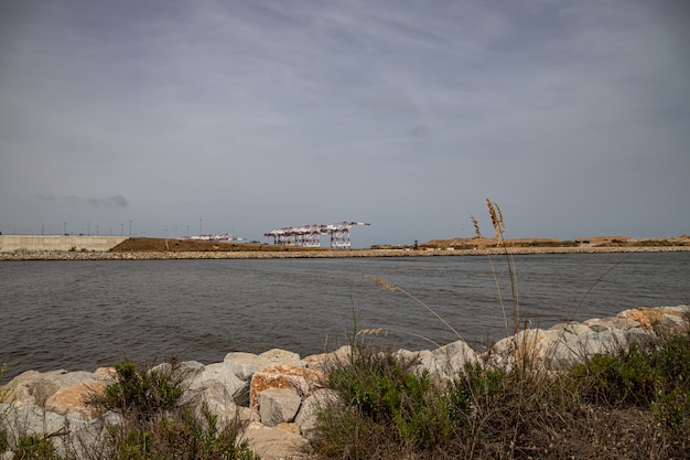 Industrial view from Mirador de la Desembocadura, Delta del Llobreat, El Prat, Catalonia, Spain