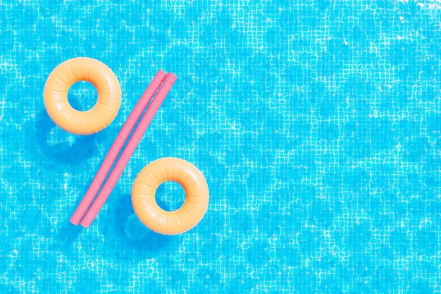 Photo inflatable laps and pool noodles forming discount icon