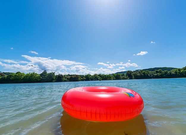 An inflatable ring in a lake on a sunny day ai generated