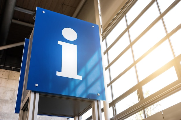 Info sign in a train station with glass windows. ideal for websites and magazines layouts.