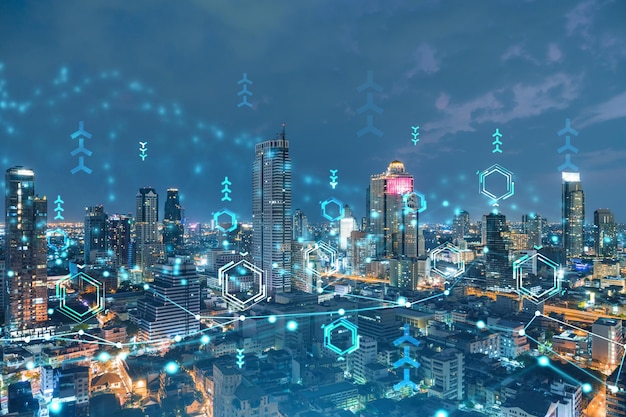 Information flow hologram night panorama city view of Bangkok The largest technological center in Southeast Asia The concept of programming science Double exposure