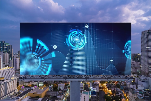 Information flow hologram on road billboard night panorama city view of Bangkok The largest technological center in Southeast Asia The concept of programming science