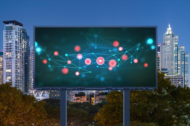 Information flow hologram on road billboard night panorama city view of Bangkok The largest technological center in Southeast Asia The concept of programming science