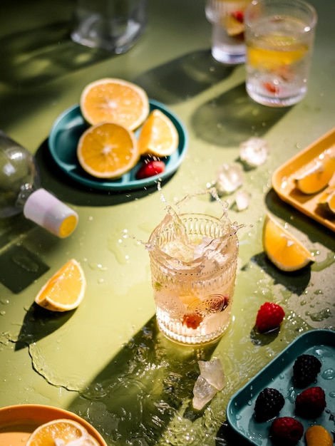 Infuse water of orange and berries in transparant glass